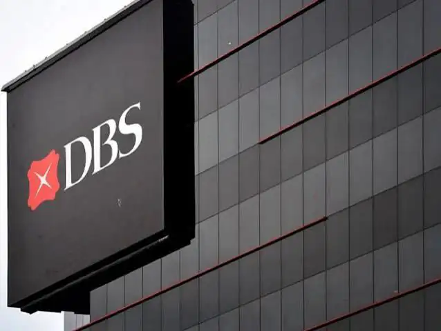 DBS Bank signs outside a branch, the red DBS mark beside the bank's name